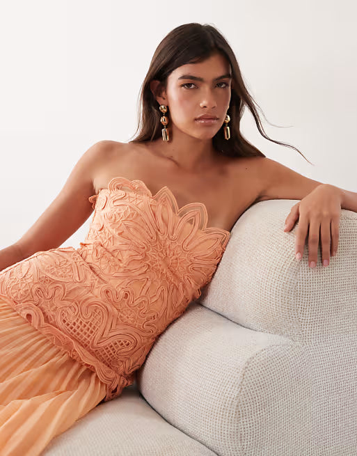 ARRANGE abstract cutwork bandeau maxi dress with pleat skirt in soft peach