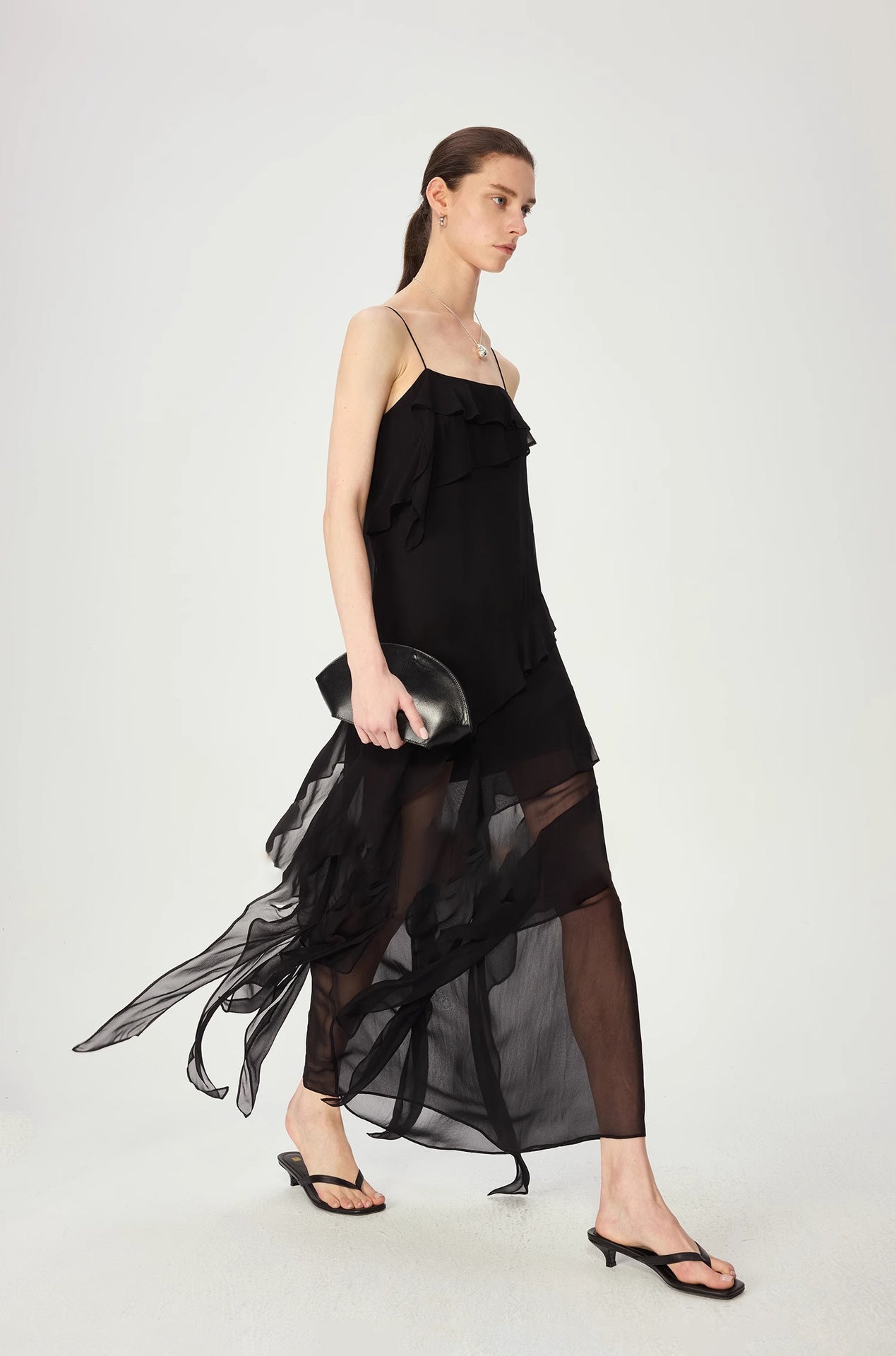 Royale bias-cut black slip dress with flounce hem