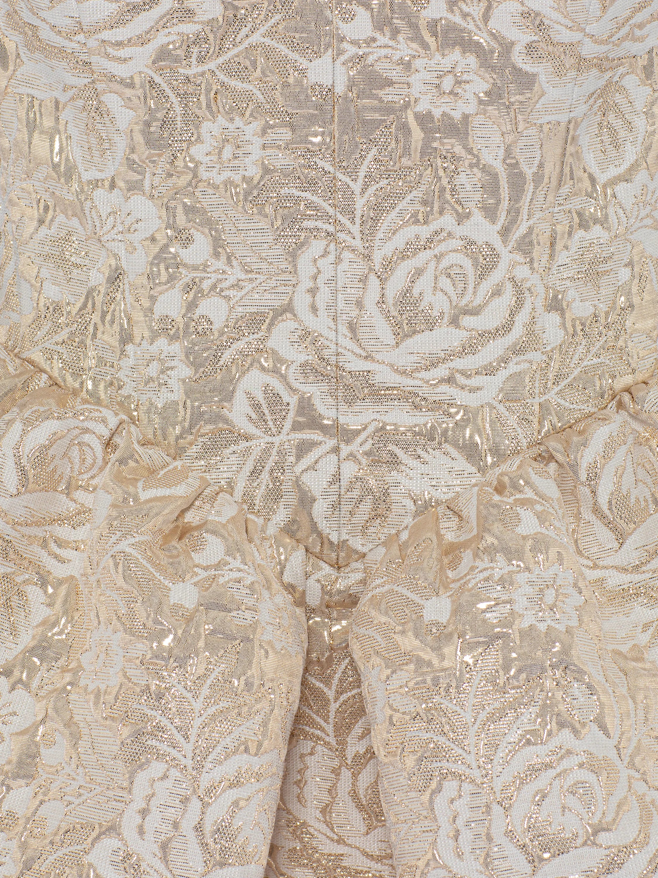 Brocade mini dress with gold rose detail in camel